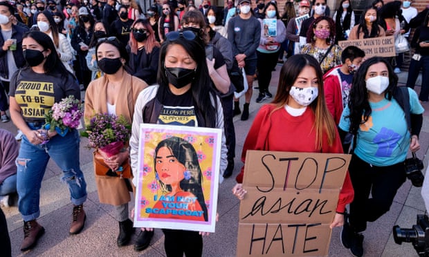 Demonstrators take part in a rally to raise awareness of anti-Asian violence in Los Angeles on 13 March. Photograph: Ringo Chiu/AFP/Getty Images